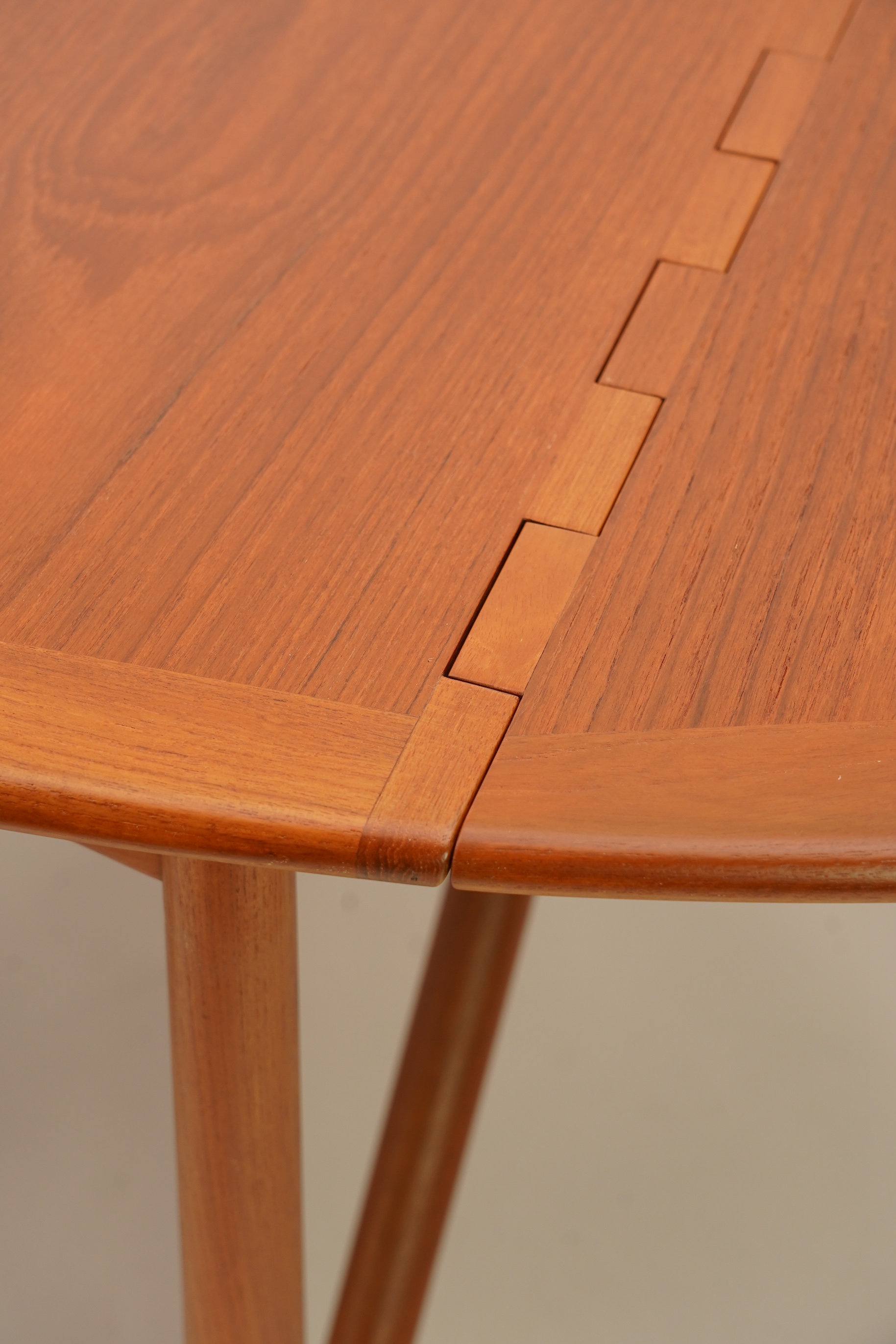 Niels Koefoed (Danish, b. 1929) for Koefoeds Møbelfabrik: A teak 'Oval Klap' dining table